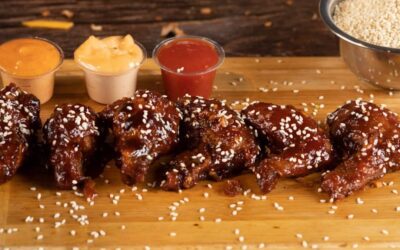 wings with sauces and sesame seeds